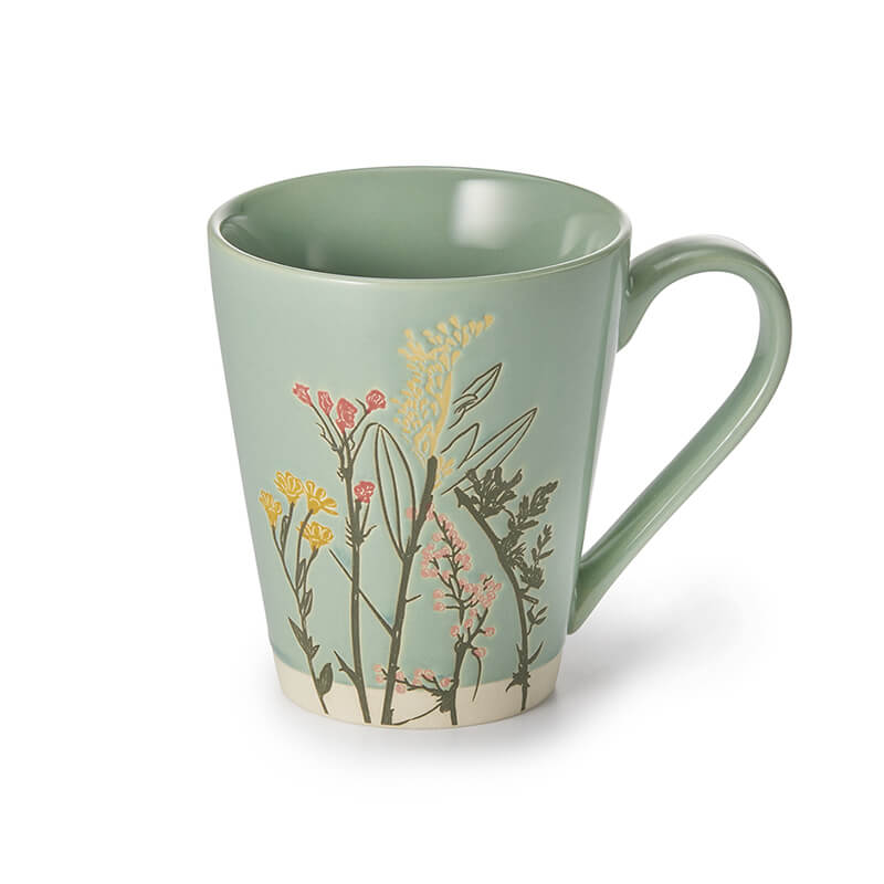 Mug-Hina mug hina da 0.3 l. ideale per bere un tè in un momento di completo relax. con il design in rilevo di fiori rende un'atmosfera perfetta